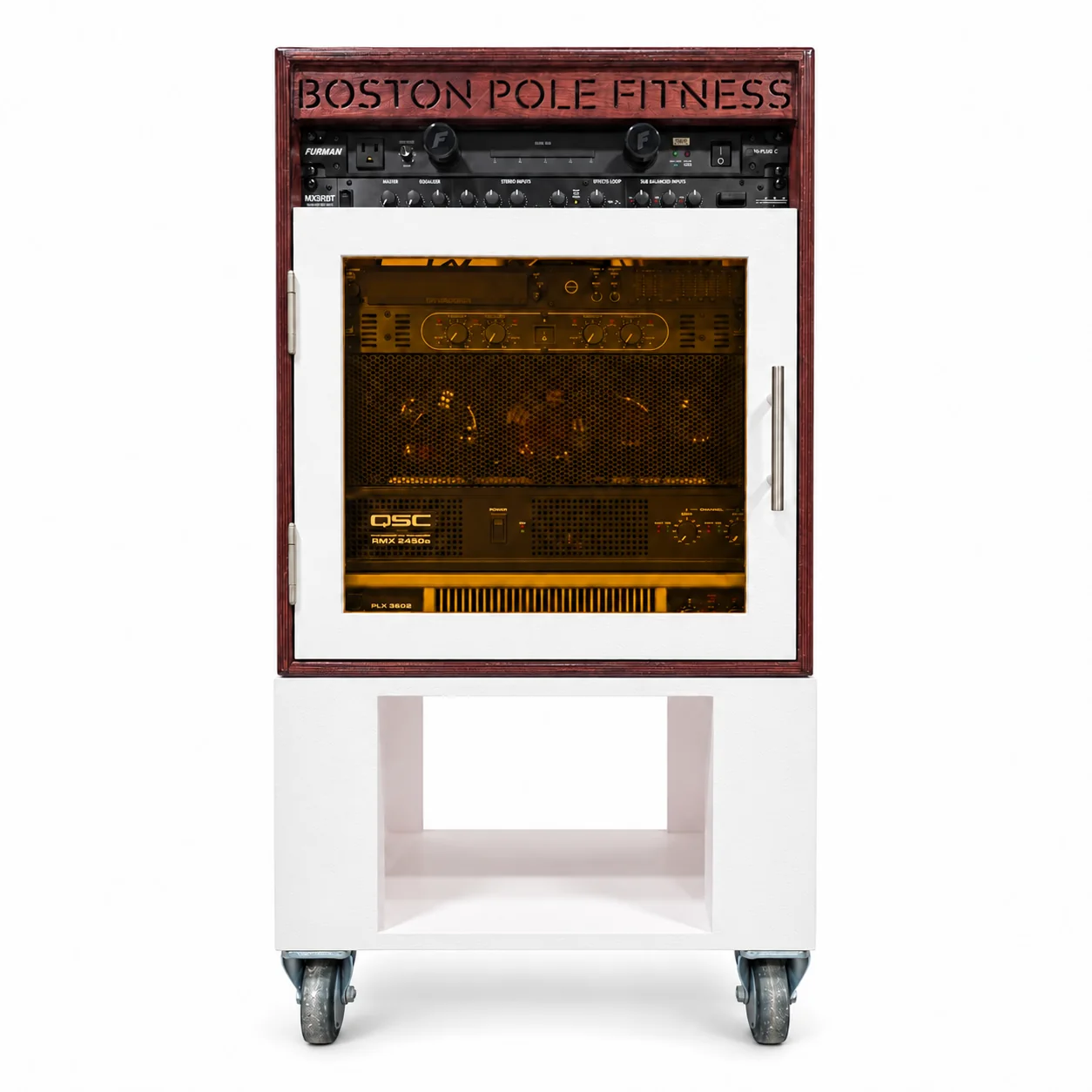 Custom stained wood audio rack with carved Boston Pole Fitness lettering and a glazed equipment door