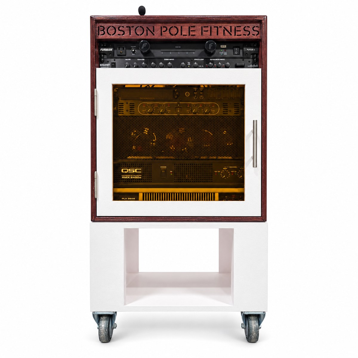 Custom stained wood audio rack with carved Boston Pole Fitness lettering and a glazed equipment door